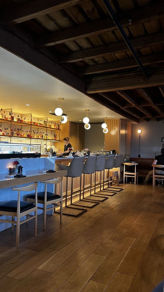 Marble bar top with backlit shelving