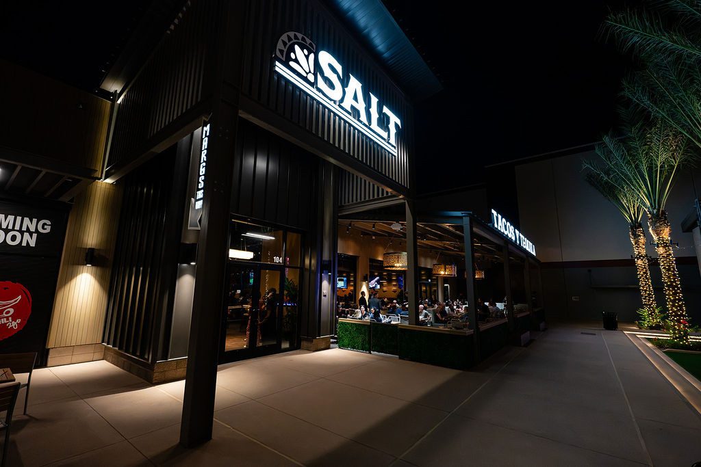 Salt Tacos y Tequila storefront and patio at Verrado Marketplace in Buckeye, interiors by Lion Craft